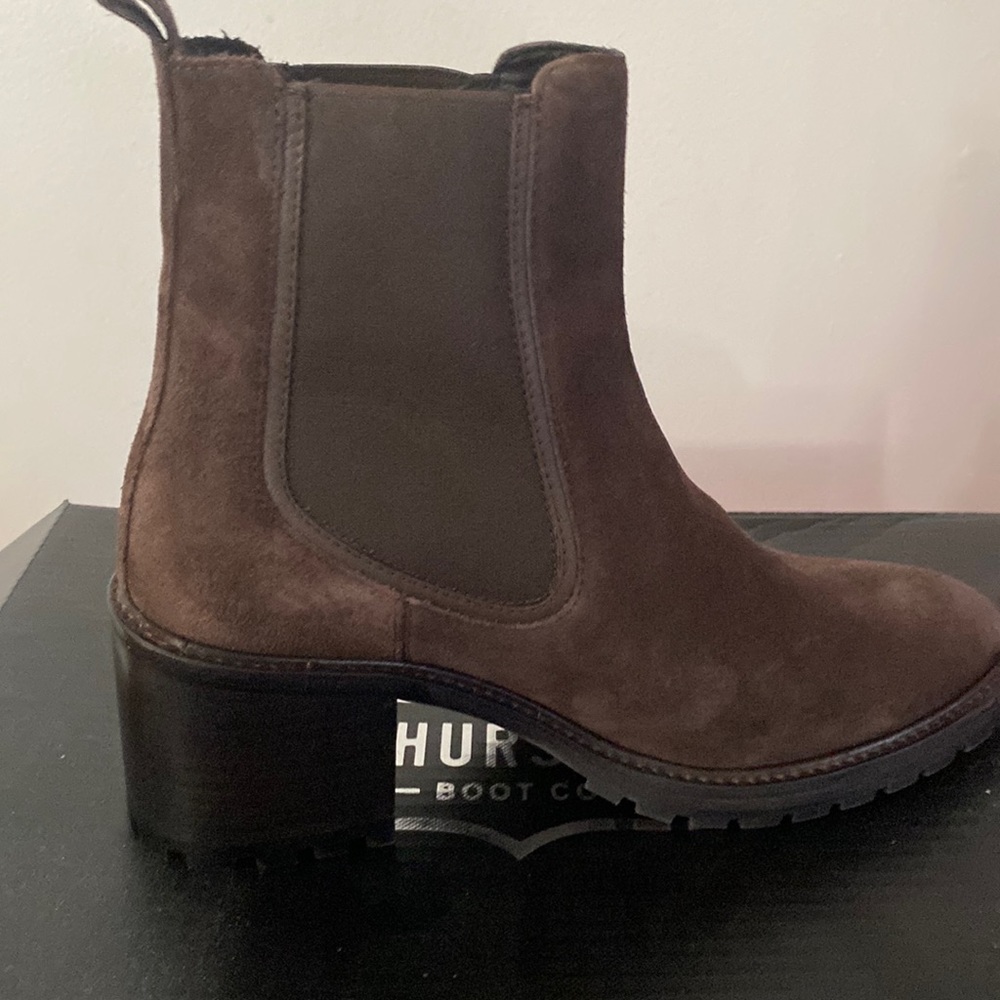 Hot casual boot. NEVER WORN STILL ON BOX